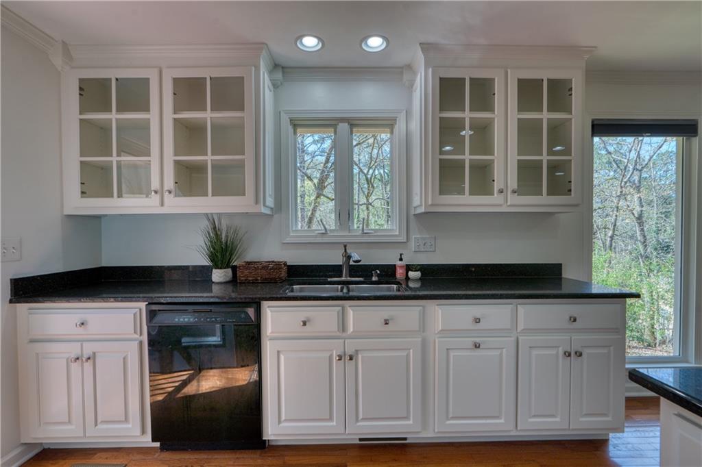 4 Wayne Street Rome, GA 30165 - Photo 11 of 51 a kitchen with granite countertop a sink and a window