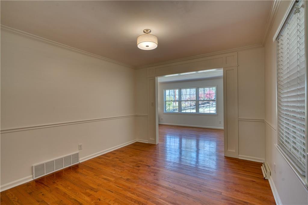 4 Wayne Street Rome, GA 30165 - Photo 17 of 51 an empty room with wooden floor and windows