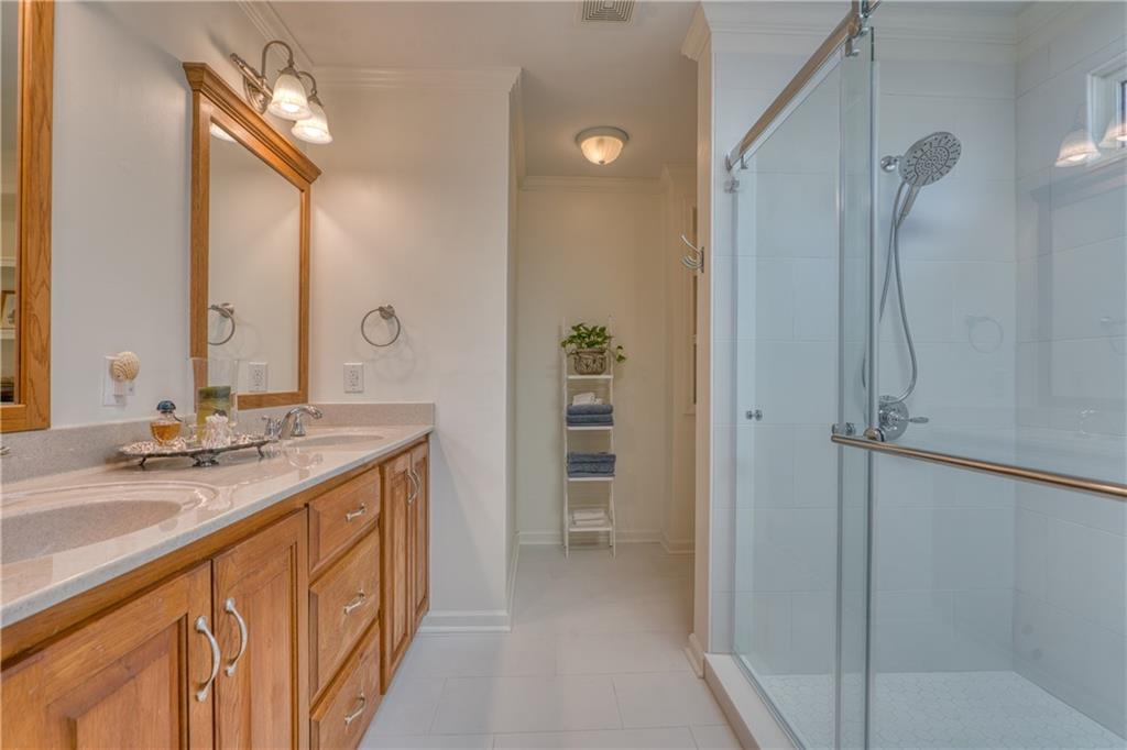 4 Wayne Street Rome, GA 30165 - Photo 21 of 51 a bathroom with a granite countertop sink and a mirror