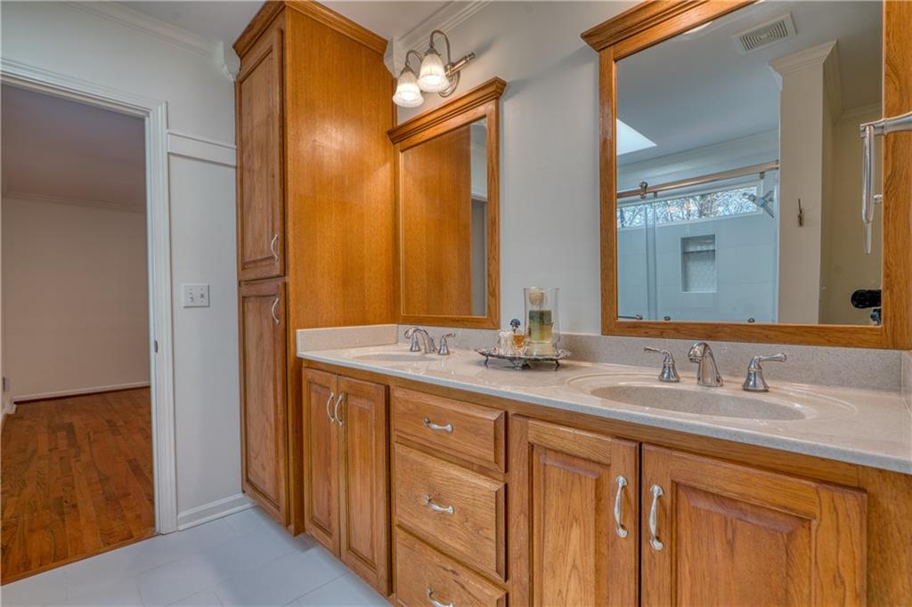 4 Wayne Street Rome, GA 30165 - Photo 24 of 51 a bathroom with a granite countertop double vanity sink and a mirror