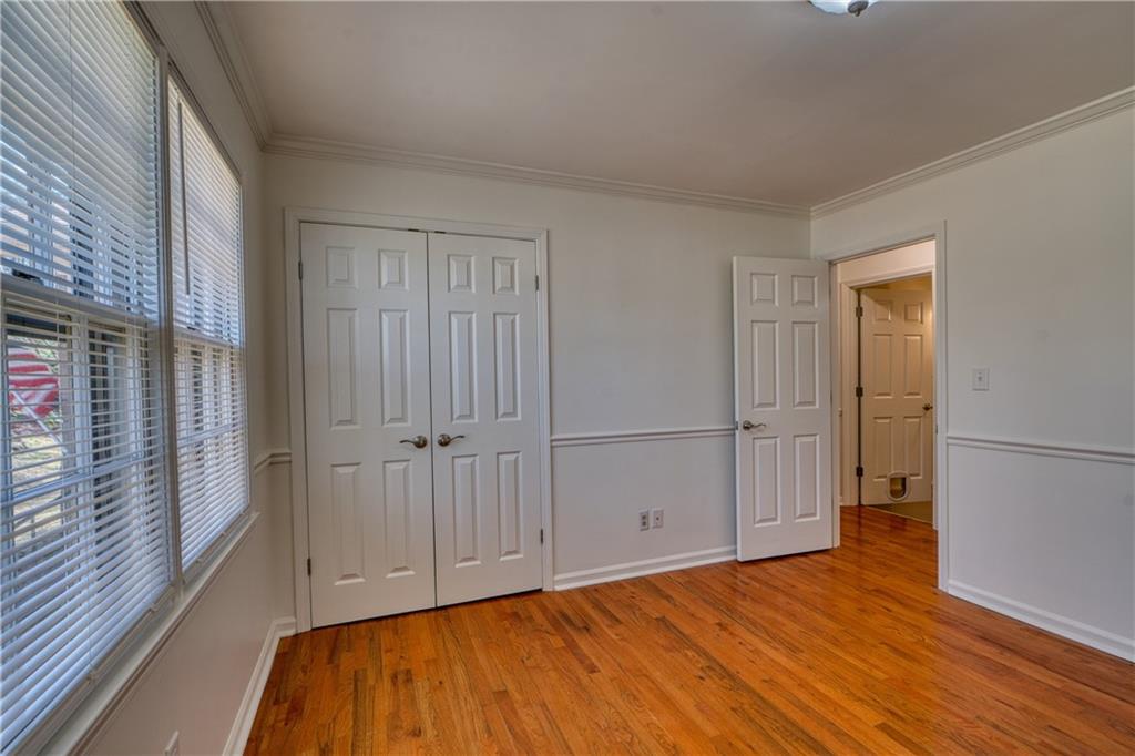 4 Wayne Street Rome, GA 30165 - Photo 27 of 51 a view of an empty room with wooden floor and a window