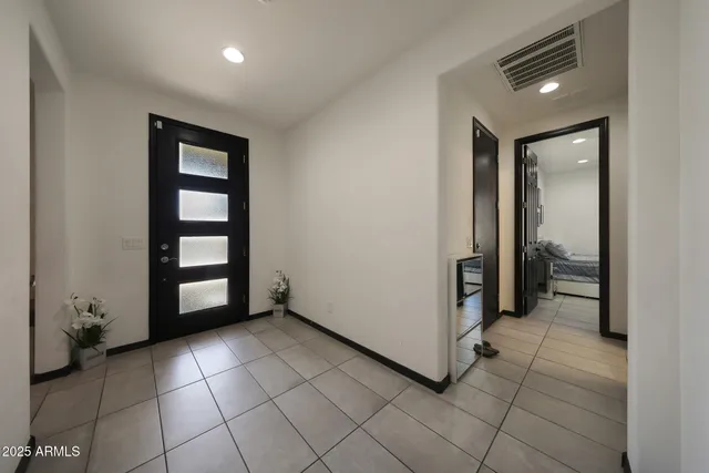 an empty room with a bathroom