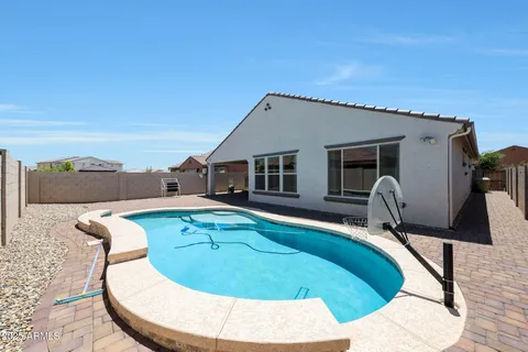a view of a house with swimming pool