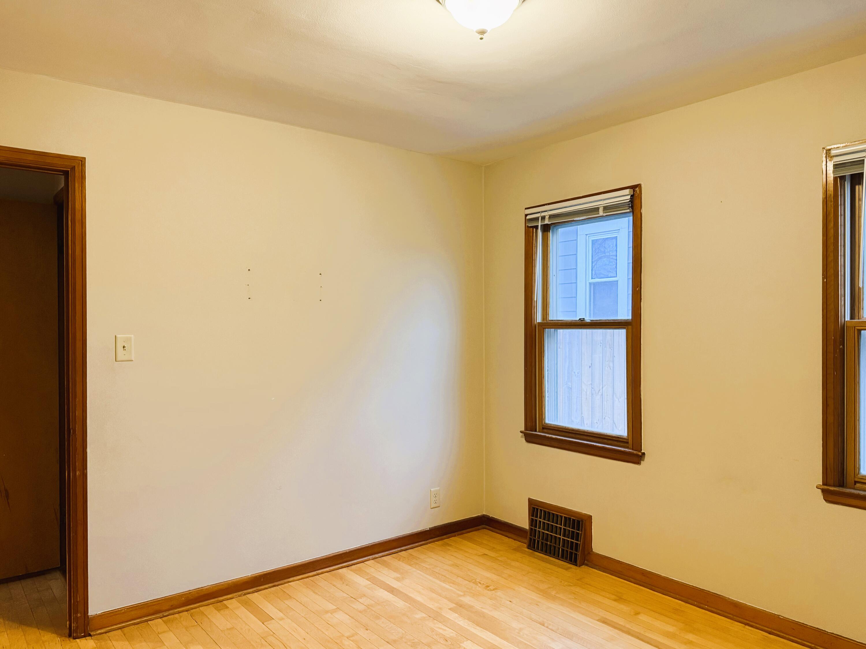 2201 South 73rd Street West Allis, WI 53219 - Photo 13 of 26 Bedroom 1 w/ Hardwood Floors