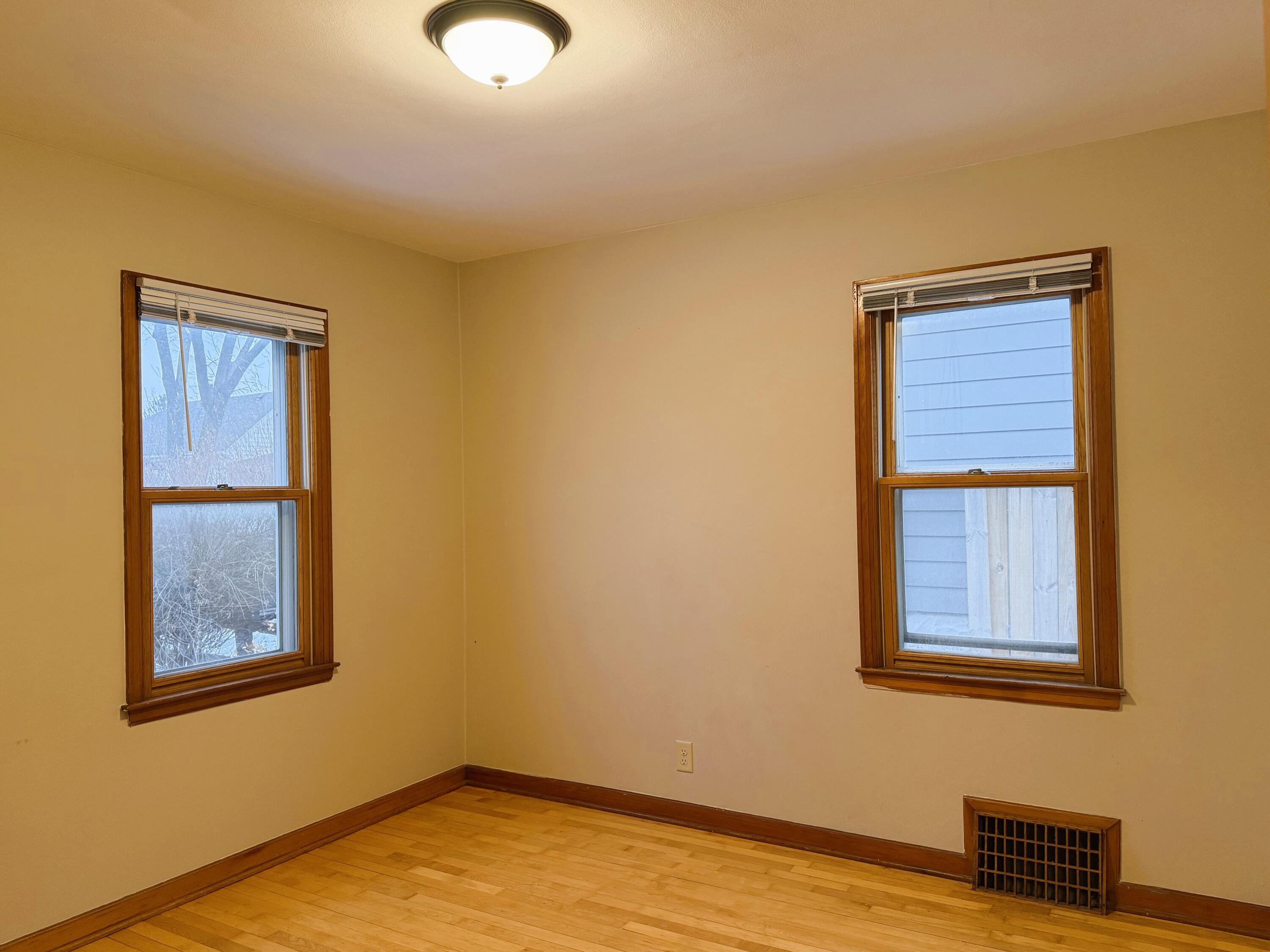 2201 South 73rd Street West Allis, WI 53219 - Photo 16 of 26 Bedroom 2 w/ Hardwood Floors