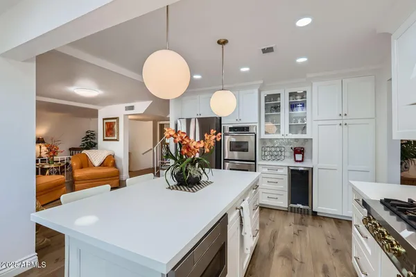 a view of a kitchen and dining room