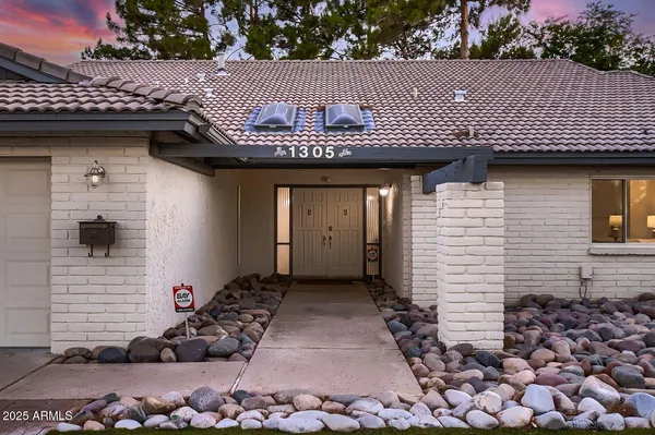 a view of a house with a patio