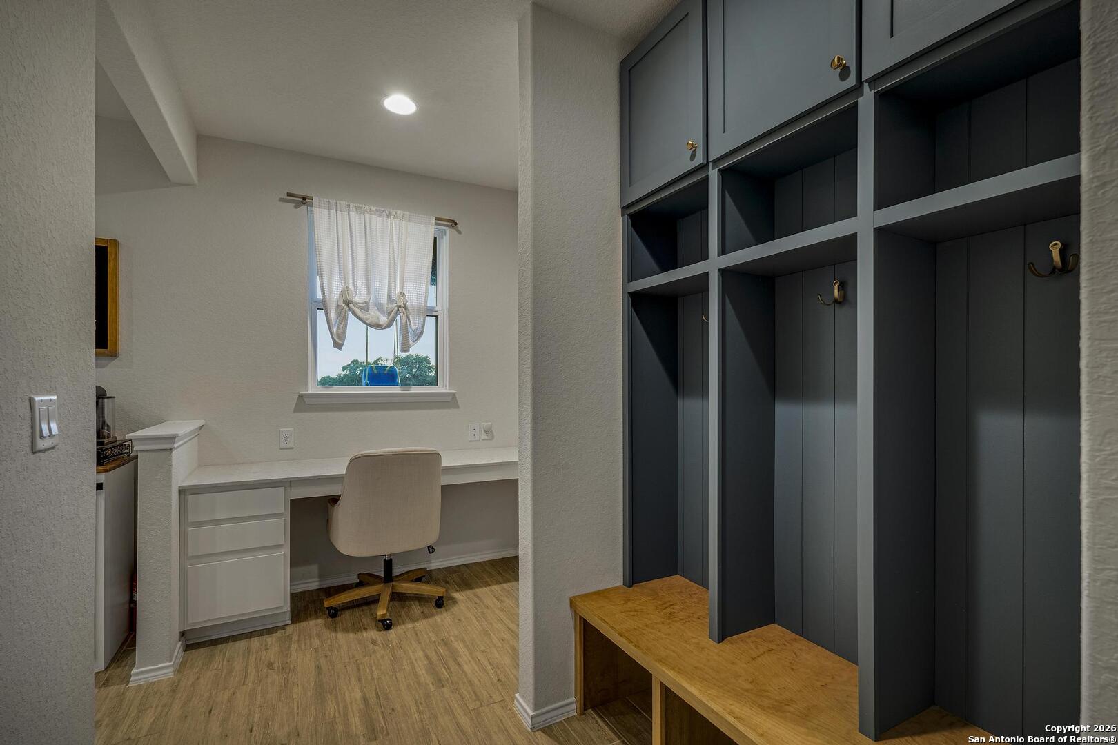 151 Inverness Boerne, TX 78015 - Photo 13 of 31 a view of a workspace with furniture and a window