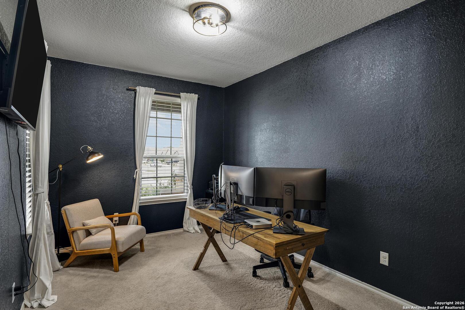 151 Inverness Boerne, TX 78015 - Photo 14 of 31 a workspace with furniture and a window