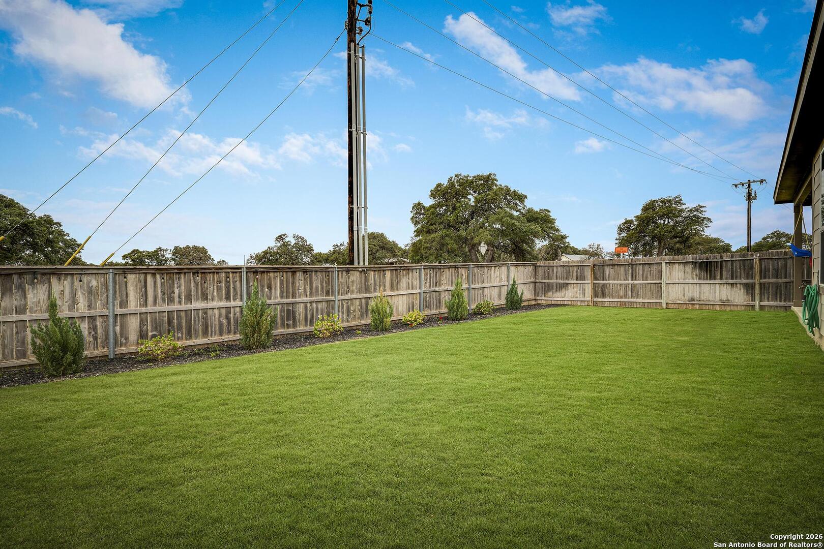 151 Inverness Boerne, TX 78015 - Photo 27 of 31 a view of a yard and a fence