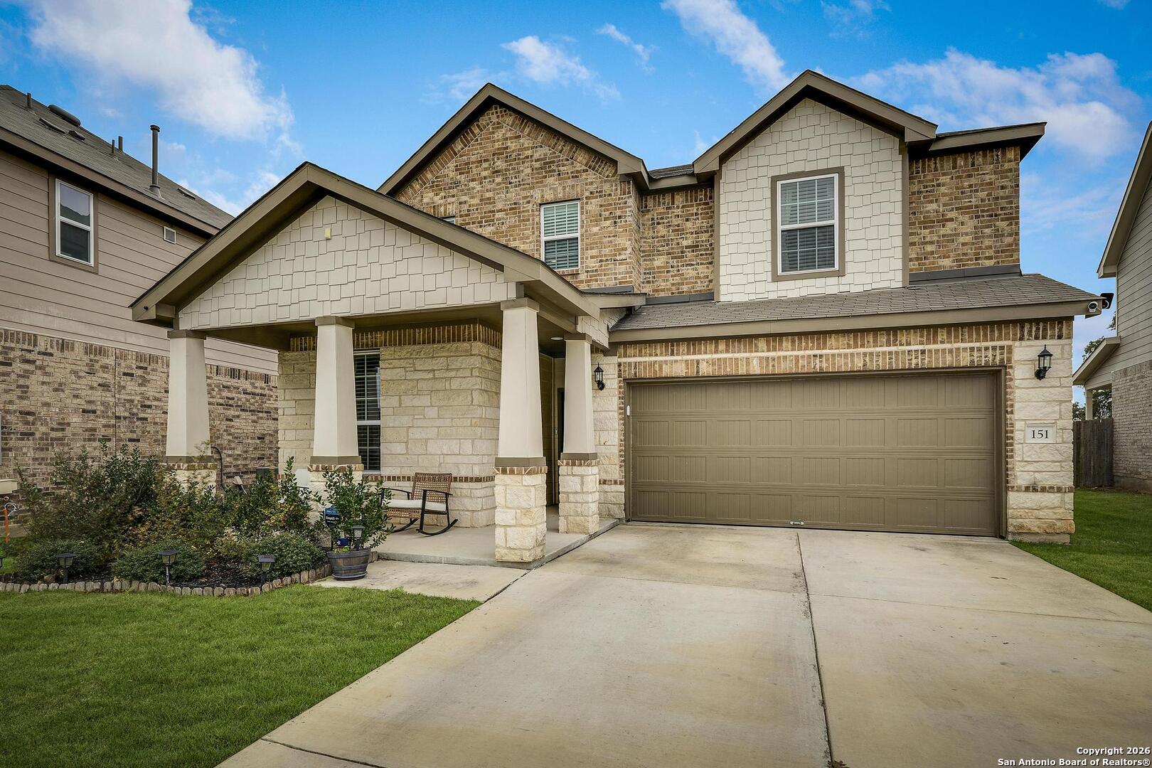 151 Inverness Boerne, TX 78015 - Photo 31 of 31 a front view of a house with a yard and garage
