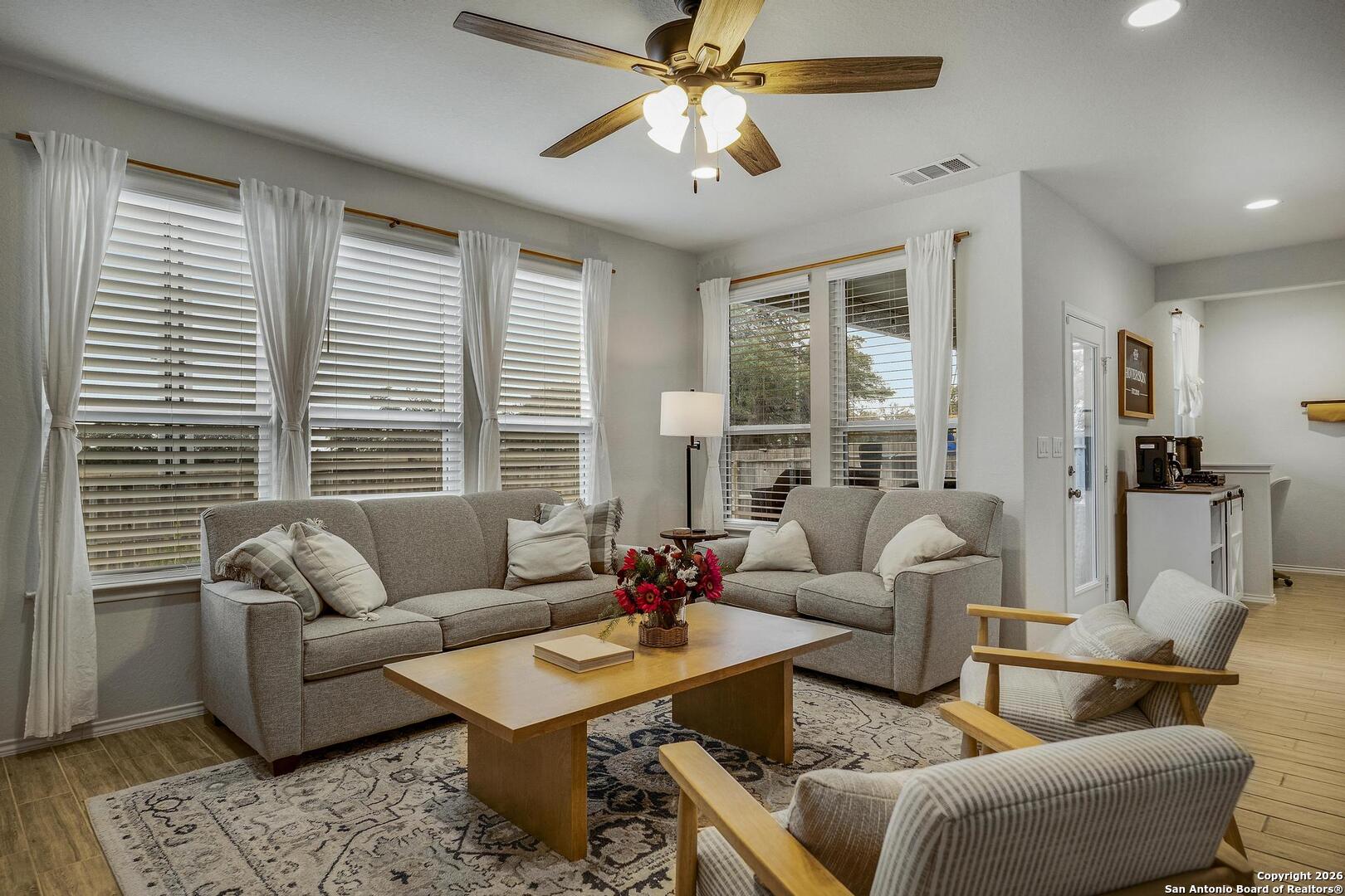 151 Inverness Boerne, TX 78015 - Photo 4 of 31 a living room with furniture and a large window