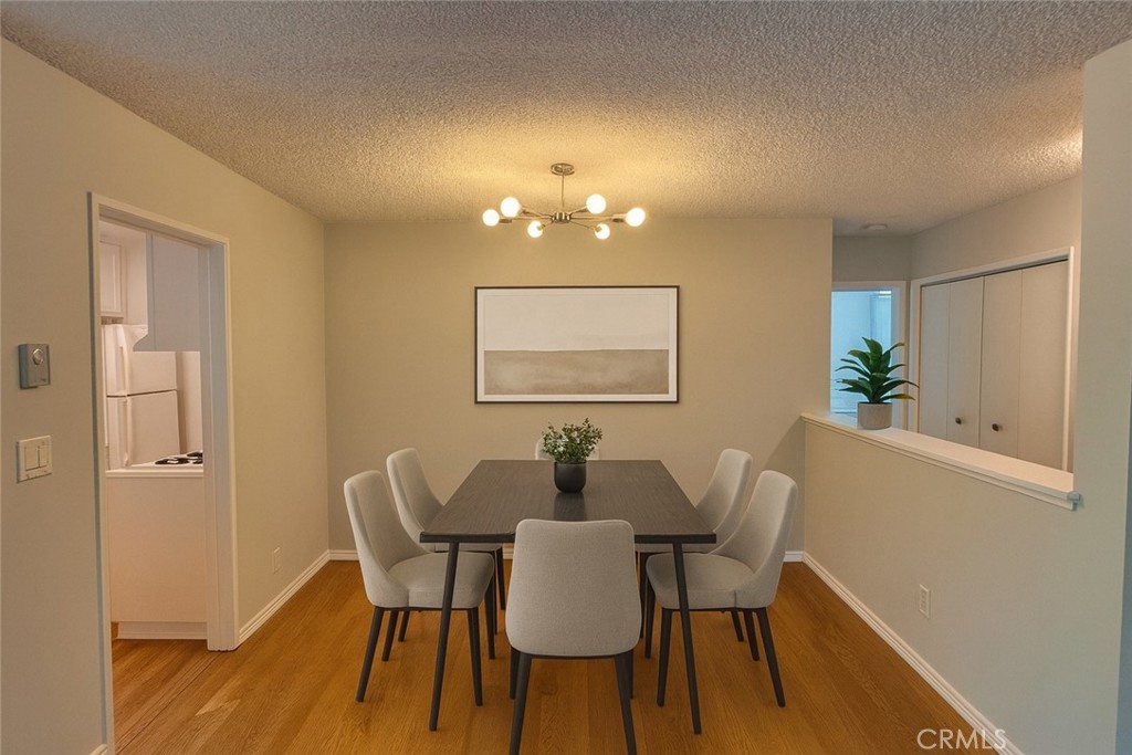 5625 North Sumner Way, Unit 212 Culver City, CA 90230 - Photo 11 of 39 a dining room with furniture and window