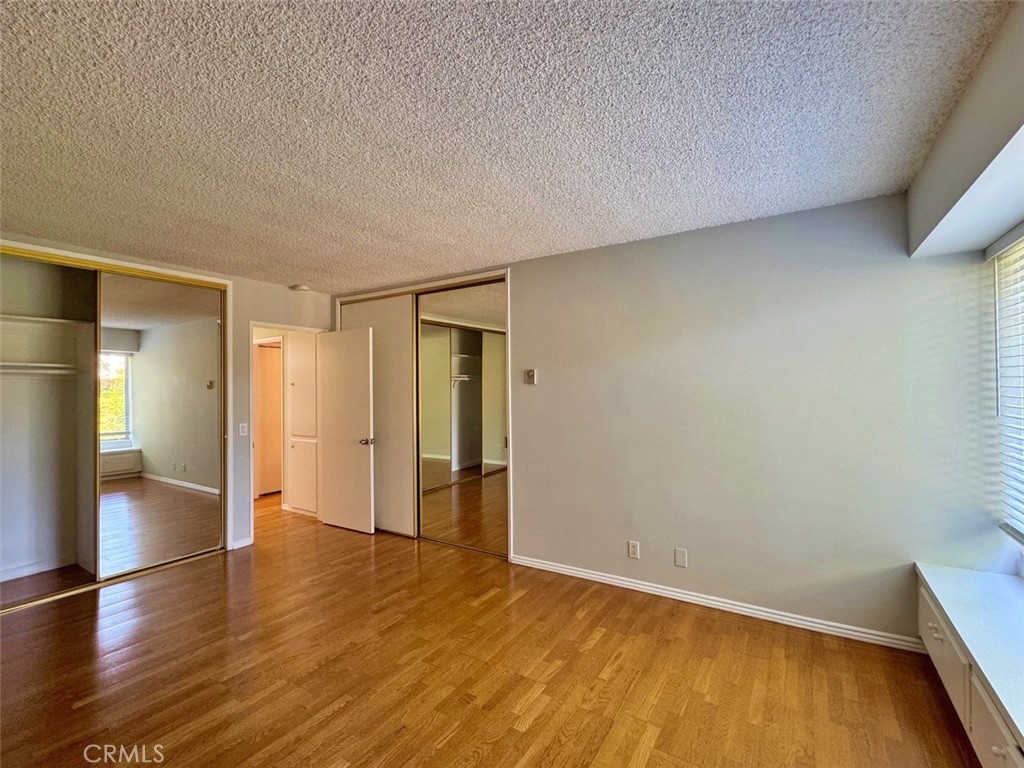 5625 North Sumner Way, Unit 212 Culver City, CA 90230 - Photo 21 of 39 a view of empty room with wooden floor