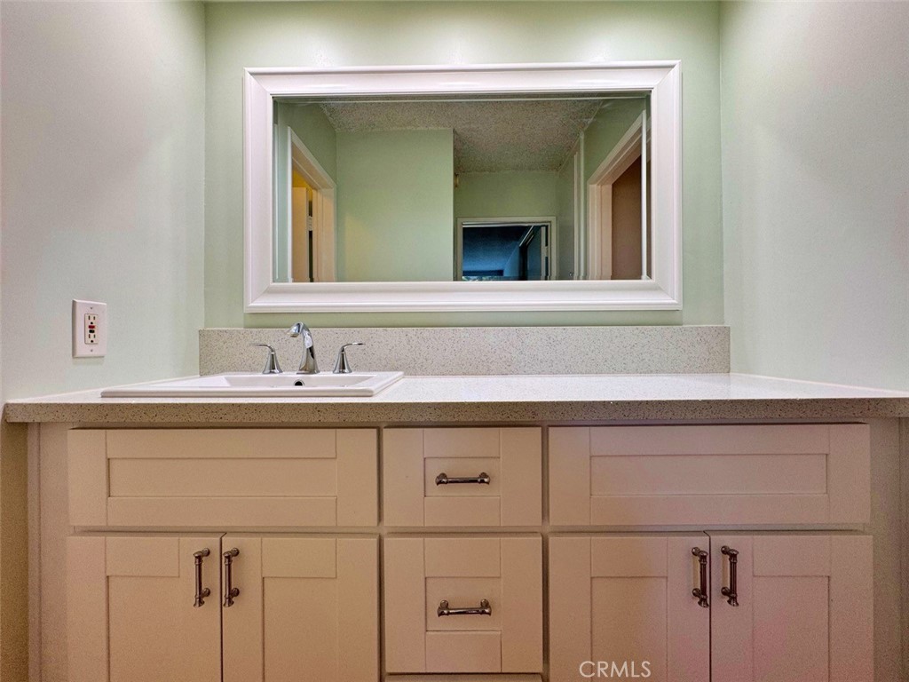 5625 North Sumner Way, Unit 212 Culver City, CA 90230 - Photo 29 of 39 a bathroom with a sink vanity and mirror