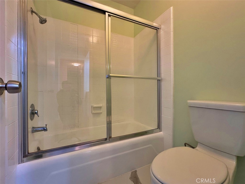 5625 North Sumner Way, Unit 212 Culver City, CA 90230 - Photo 30 of 39 a white toilet sitting next to a bathroom sink