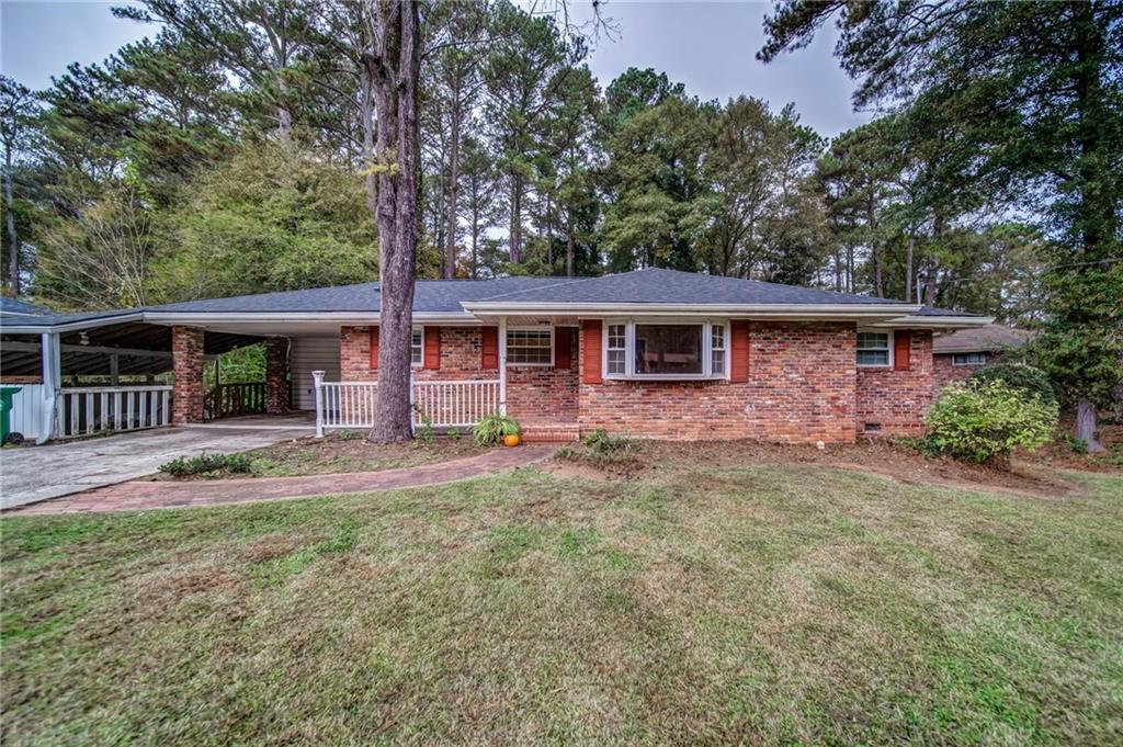 2882 Hollywood Drive Decatur, GA 30033 - Photo 1 of 1 front view of a house with a yard