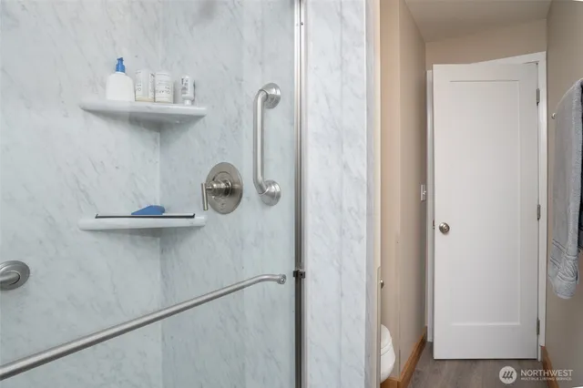 a view of a hallway with front door