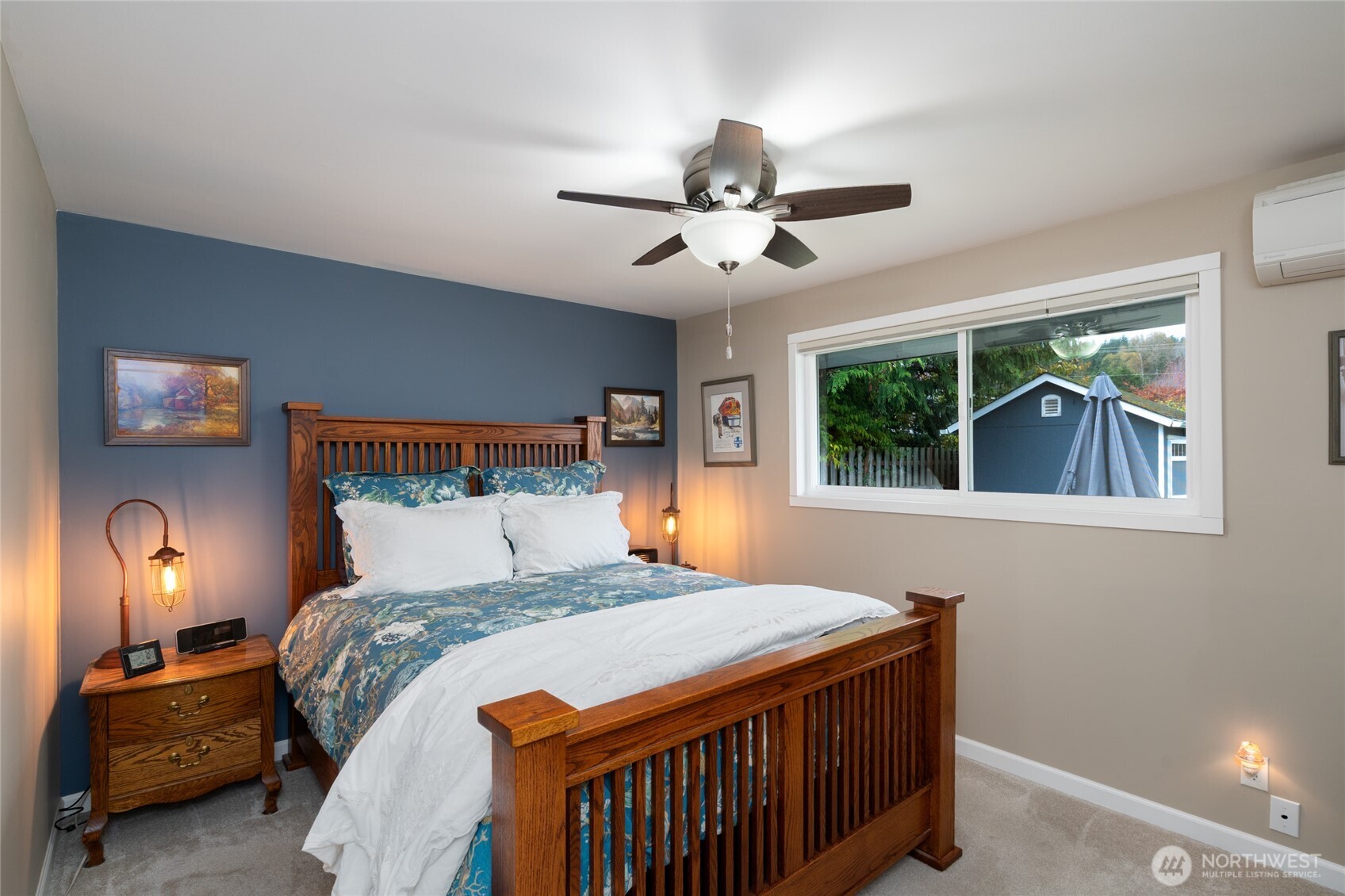2304 E Avenue Anacortes, WA 98221 - Photo 13 of 26 a bedroom with a bed and a window