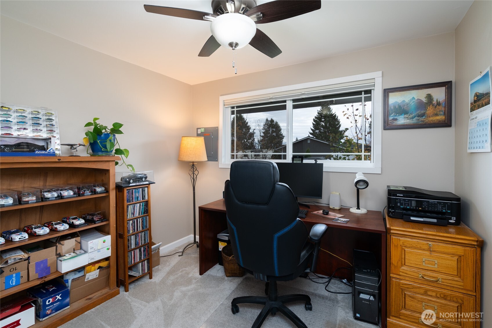 2304 E Avenue Anacortes, WA 98221 - Photo 17 of 26 a view of a workspace with furniture and a window