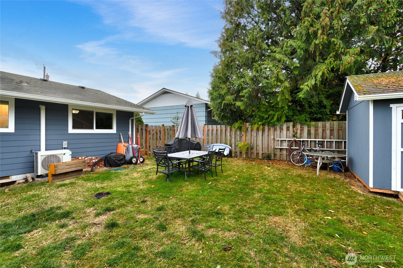 2304 E Avenue Anacortes, WA 98221 - Photo 25 of 26 a view of a house with backyard and sitting area