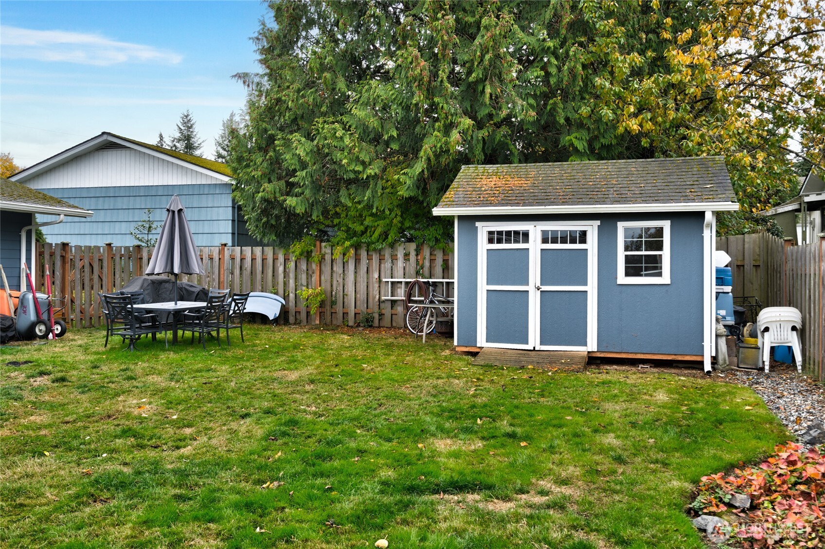 2304 E Avenue Anacortes, WA 98221 - Photo 26 of 26 a front view of house with yard and outdoor seating