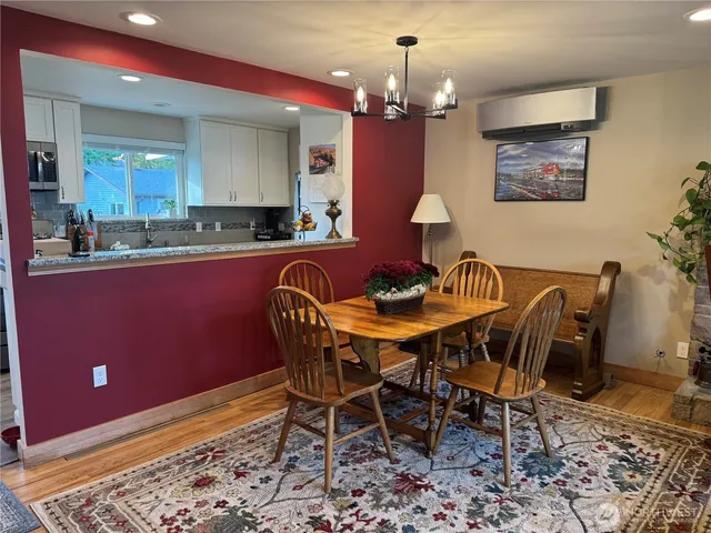 a view of a dining room with furniture