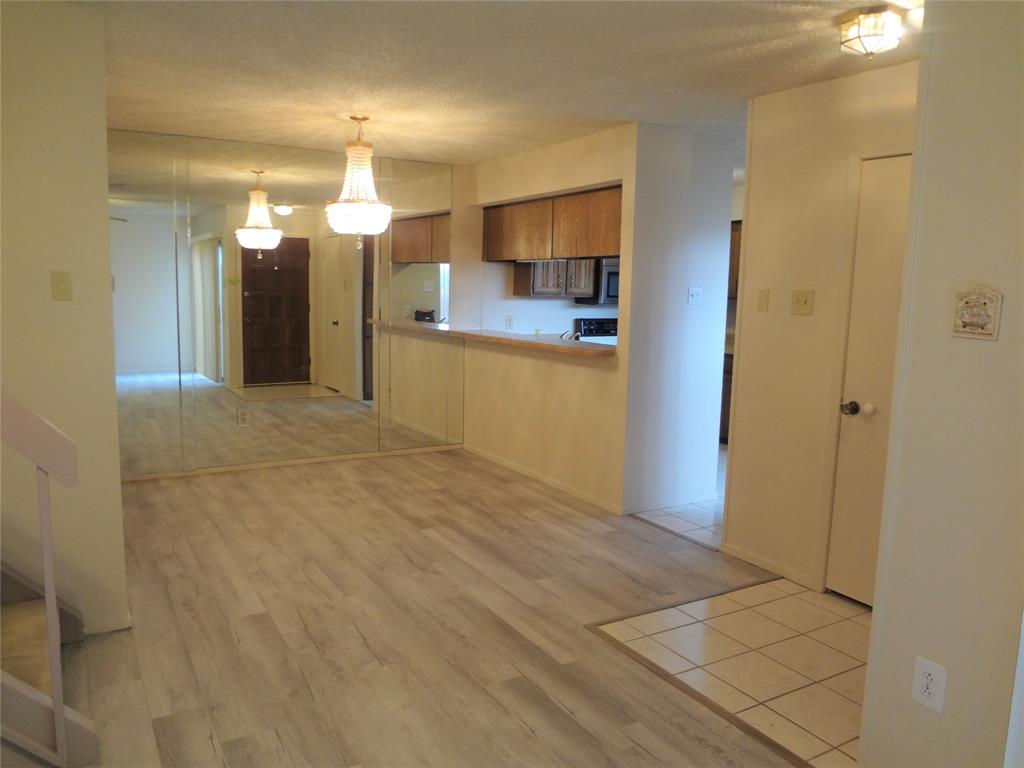 a view of a kitchen with a sink