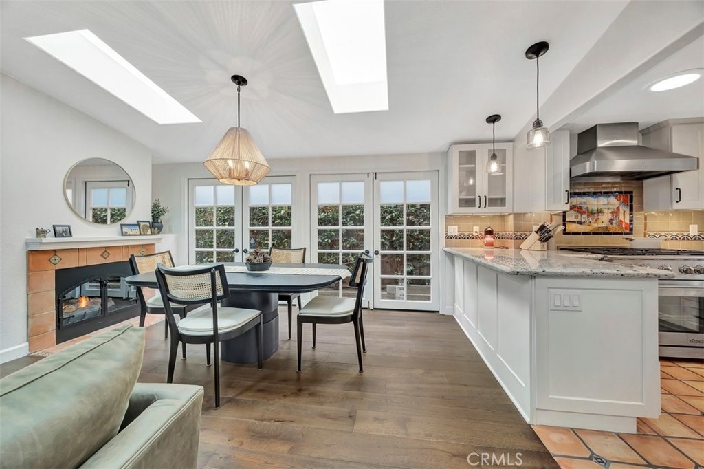 306 Avenida Monterey San Clemente, CA 92672 - Photo 12 of 41 a view of a dining room with furniture window and wooden floor