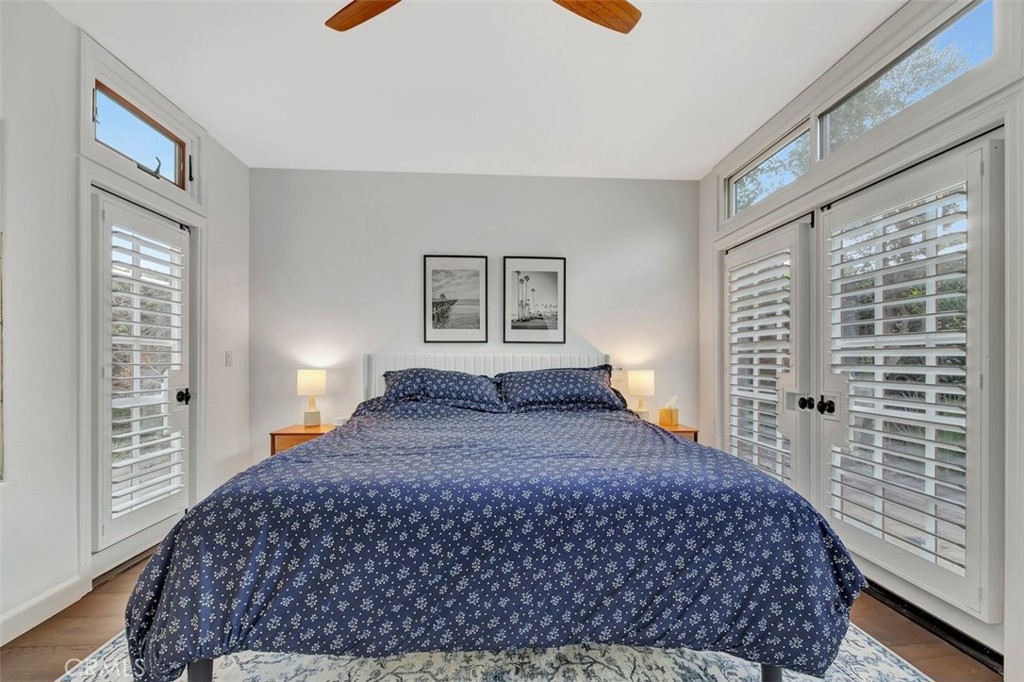 306 Avenida Monterey San Clemente, CA 92672 - Photo 18 of 41 a bedroom with a large bed and a window