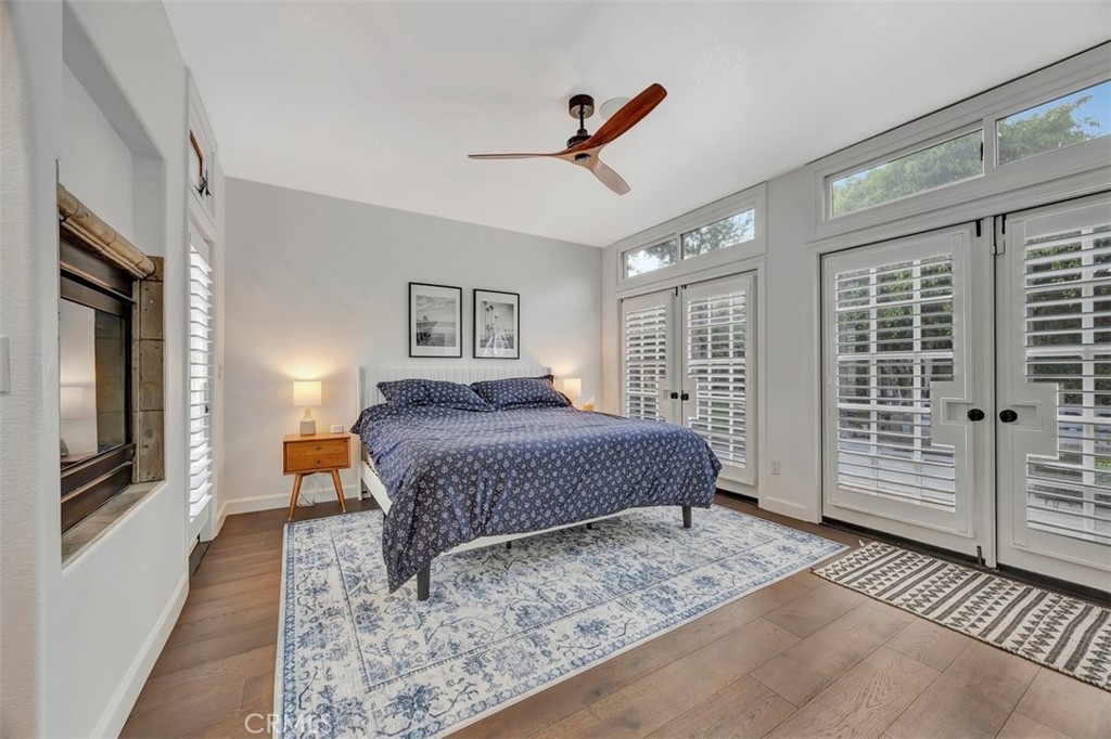 306 Avenida Monterey San Clemente, CA 92672 - Photo 19 of 41 a bedroom with a balcony a bed and a dresser