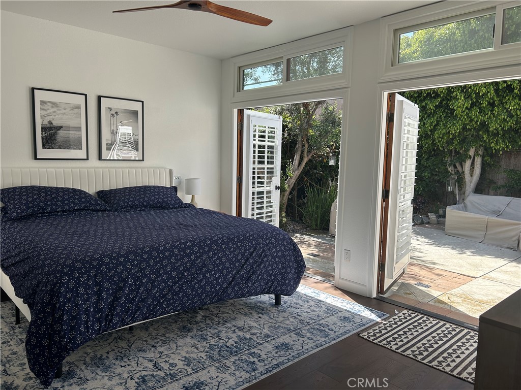 306 Avenida Monterey San Clemente, CA 92672 - Photo 21 of 41 a bedroom with a bed and a window