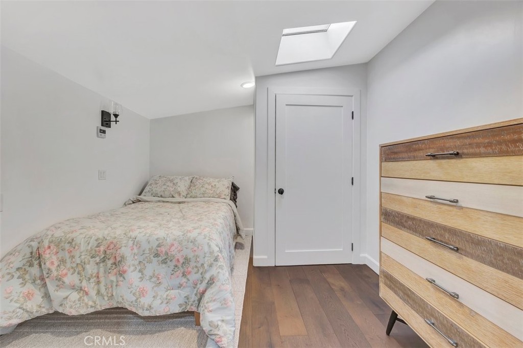 306 Avenida Monterey San Clemente, CA 92672 - Photo 29 of 41 a bedroom with a bed and a window