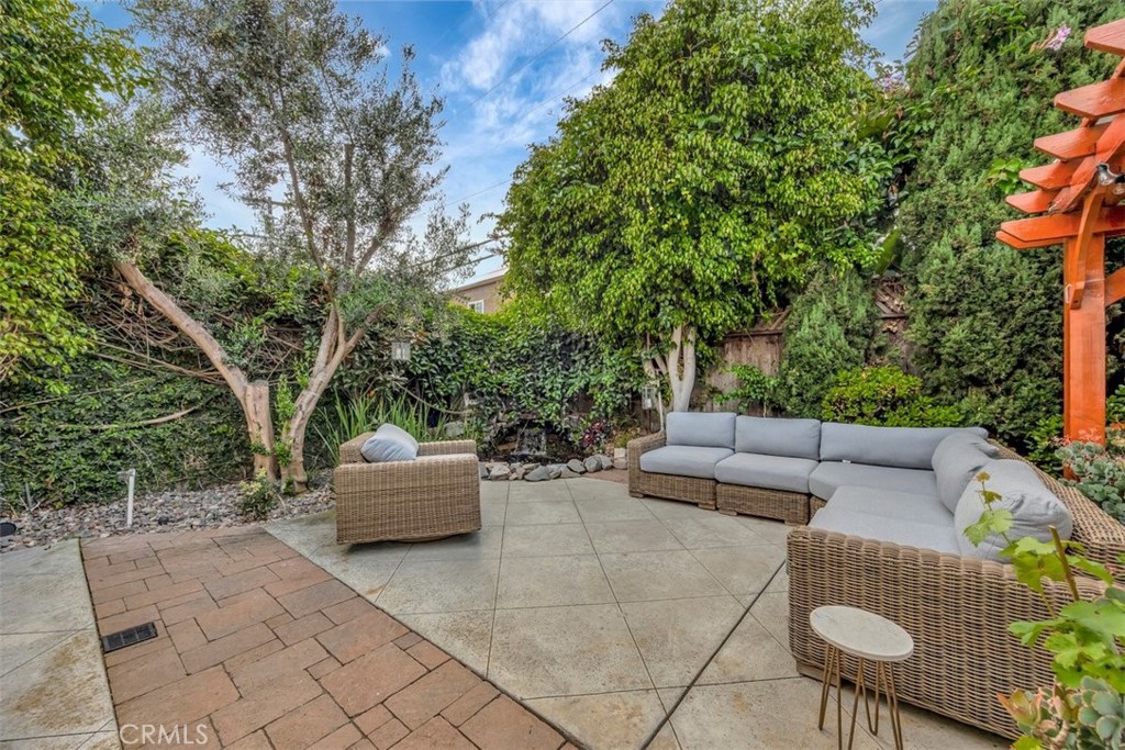 306 Avenida Monterey San Clemente, CA 92672 - Photo 30 of 41 a view of outdoor sitting area with couch and trees