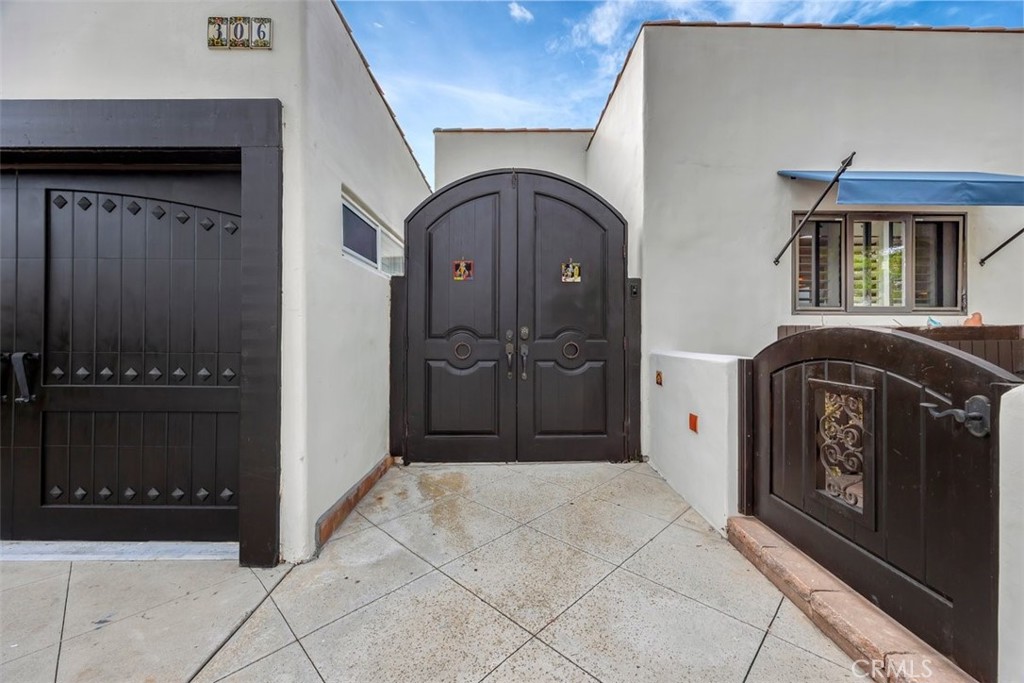 306 Avenida Monterey San Clemente, CA 92672 - Photo 6 of 41 a view of front door with washer and dryer