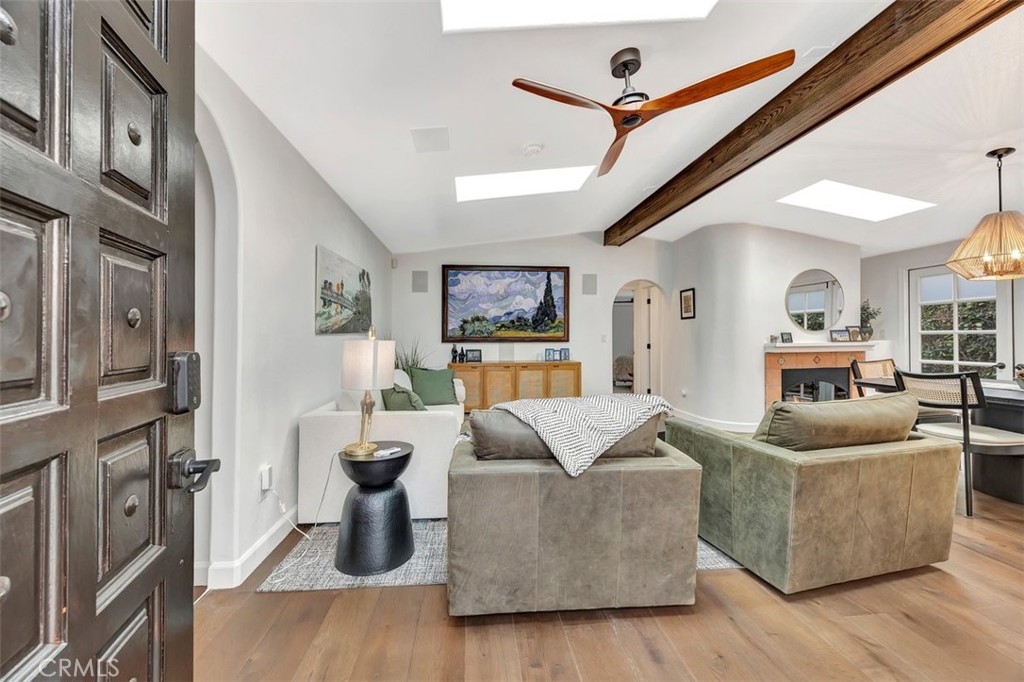 306 Avenida Monterey San Clemente, CA 92672 - Photo 9 of 41 a living room with furniture and a chandelier
