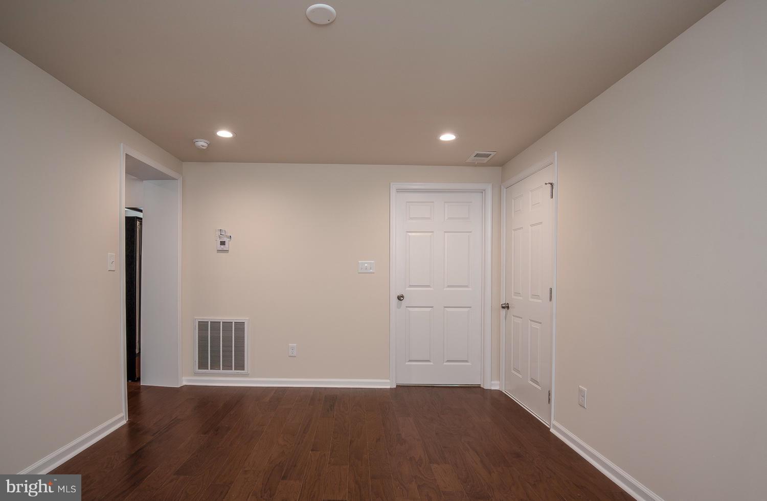 3116 Lewiston Road Bumpass, VA 23024 - Photo 11 of 27 a view of an empty room with wooden floor