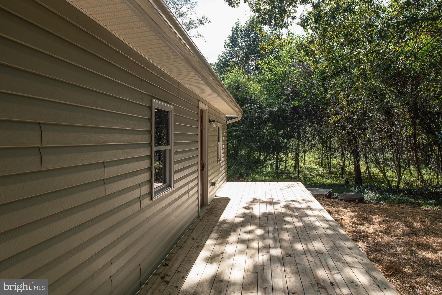 3116 Lewiston Road Bumpass, VA 23024 - Photo 24 of 27 a view of backyard with green space
