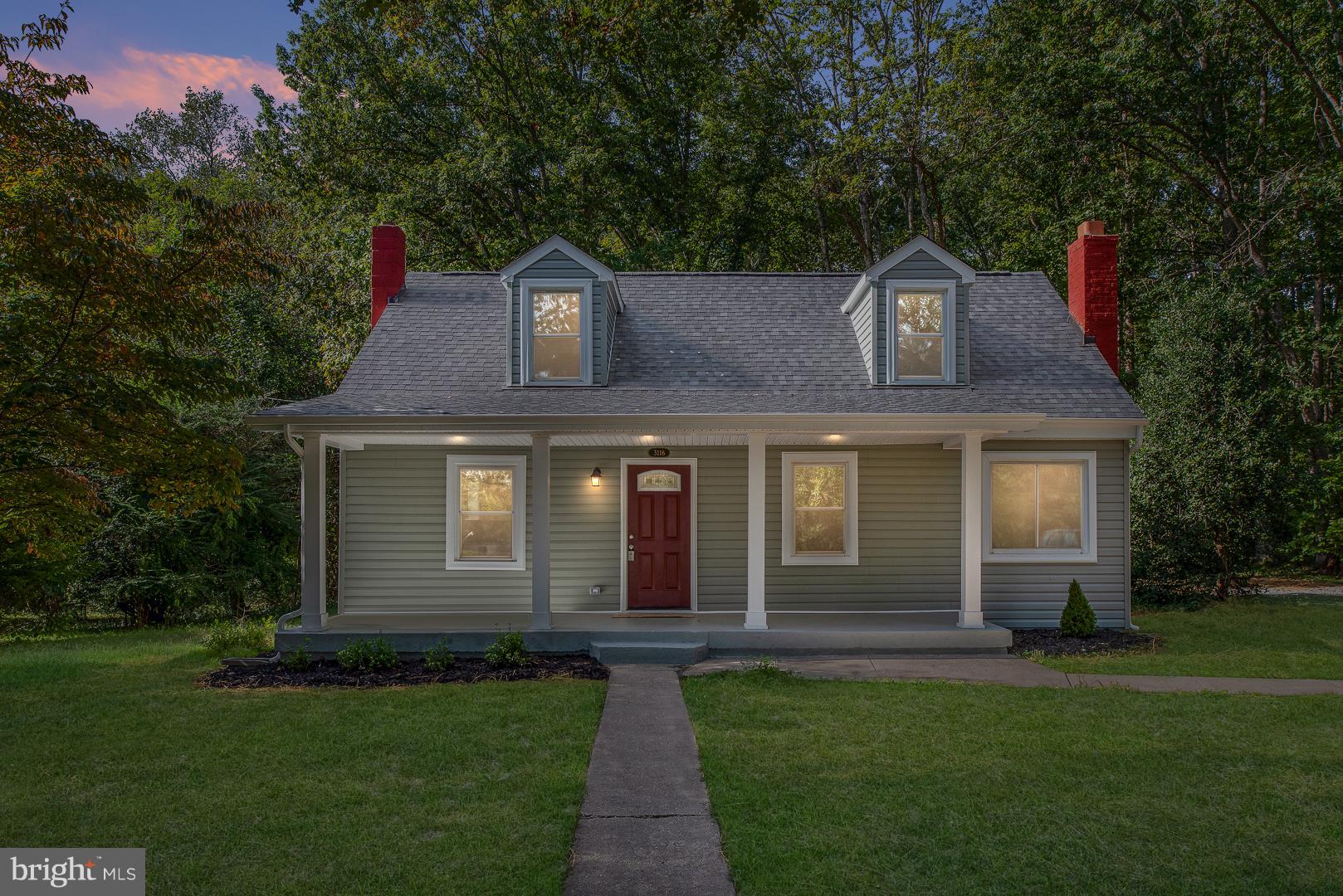 3116 Lewiston Road Bumpass, VA 23024 - Photo 27 of 27 a front view of a house with a garden