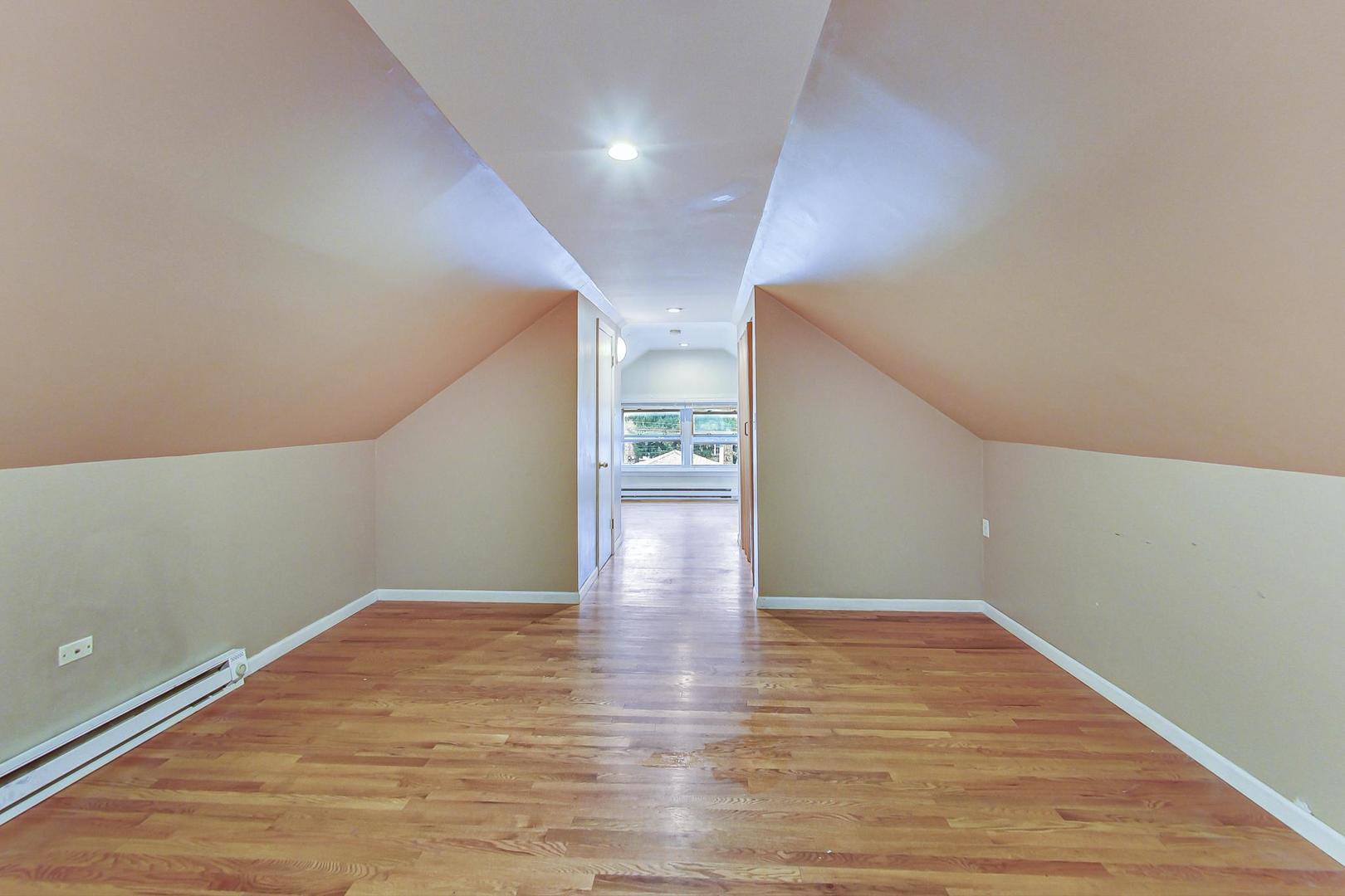 6522 28th Street Berwyn, IL 60402 - Photo 19 of 45 a view of empty room with wooden floor