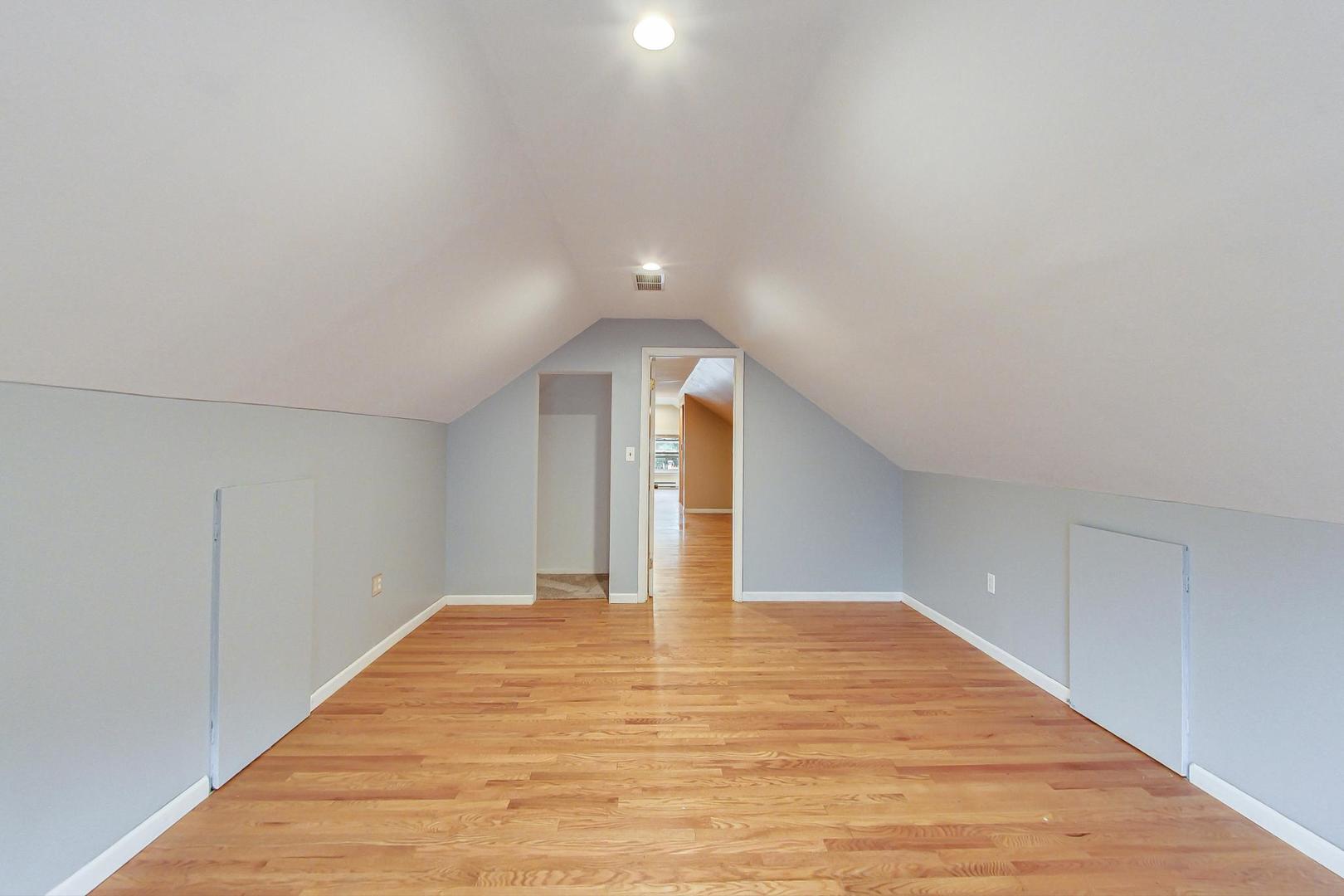 6522 28th Street Berwyn, IL 60402 - Photo 21 of 45 a view of empty room with wooden floor
