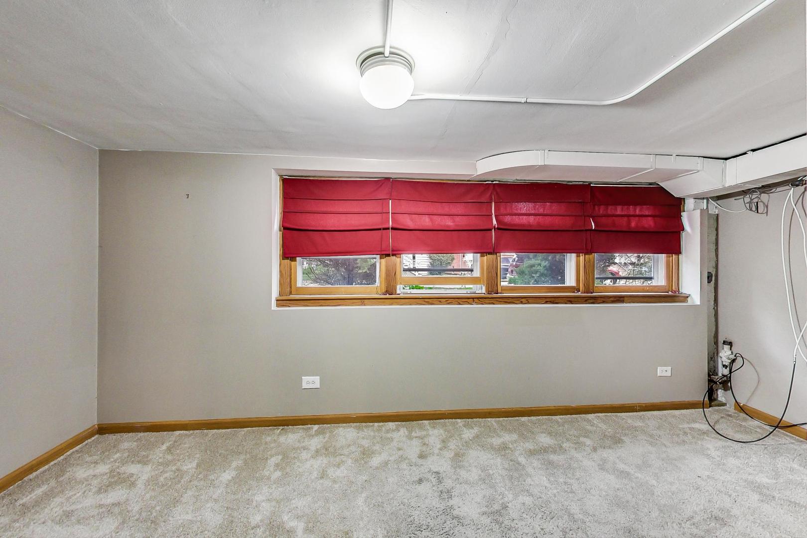 6522 28th Street Berwyn, IL 60402 - Photo 28 of 45 a view of a room with wooden floor