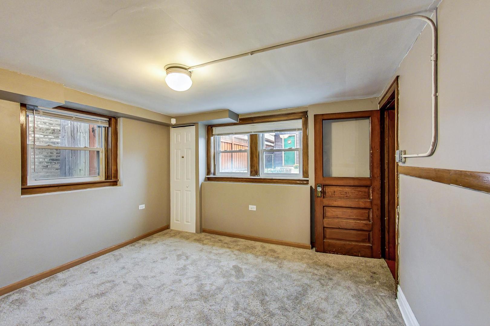 6522 28th Street Berwyn, IL 60402 - Photo 31 of 45 a view of an empty room with a window