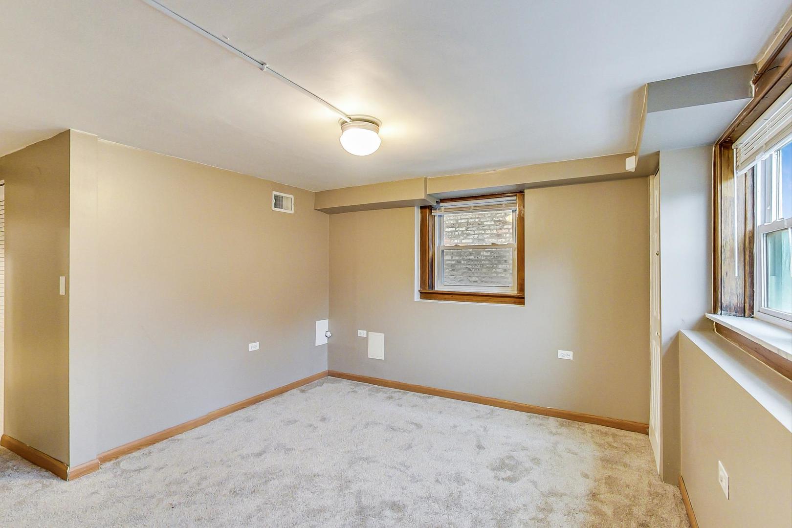 6522 28th Street Berwyn, IL 60402 - Photo 32 of 45 a view of an empty room with a window