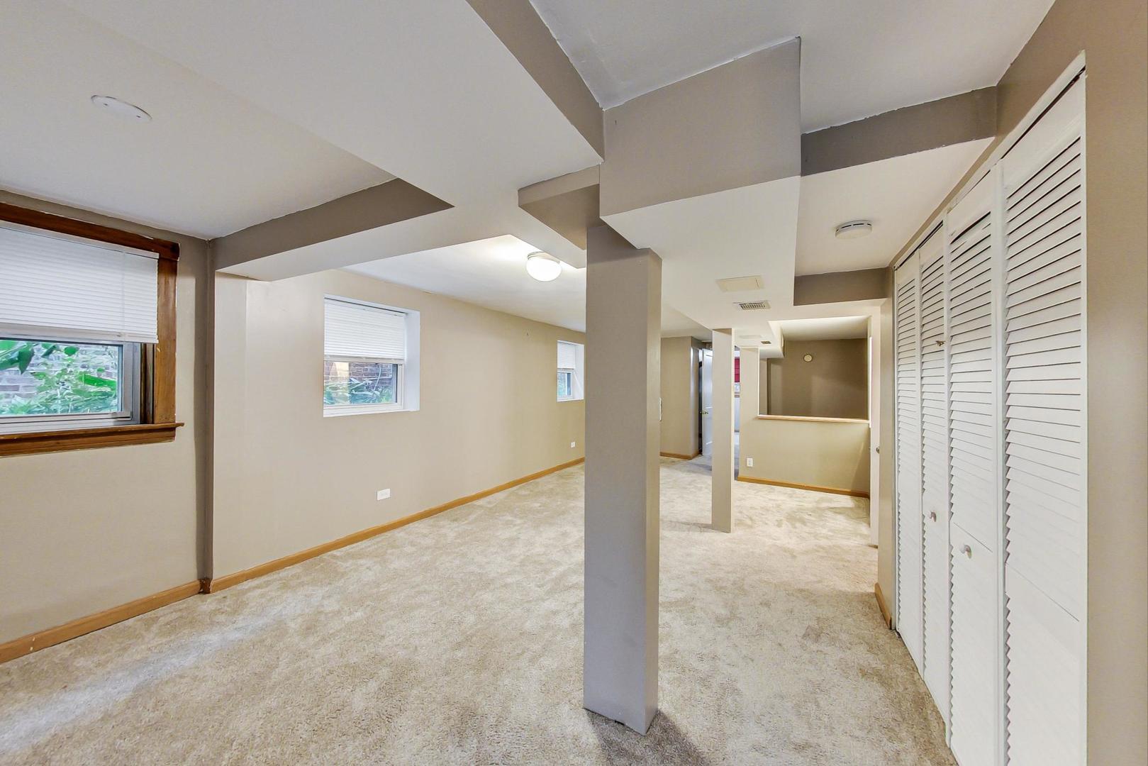 6522 28th Street Berwyn, IL 60402 - Photo 33 of 45 a view of a hallway with wooden shelves