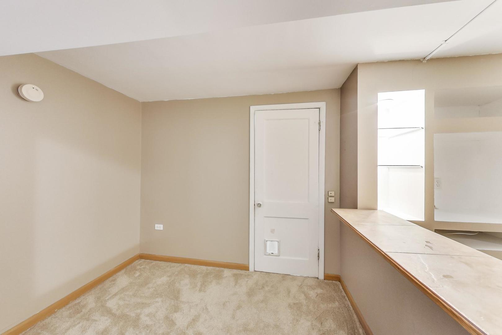 6522 28th Street Berwyn, IL 60402 - Photo 35 of 45 an empty room with windows