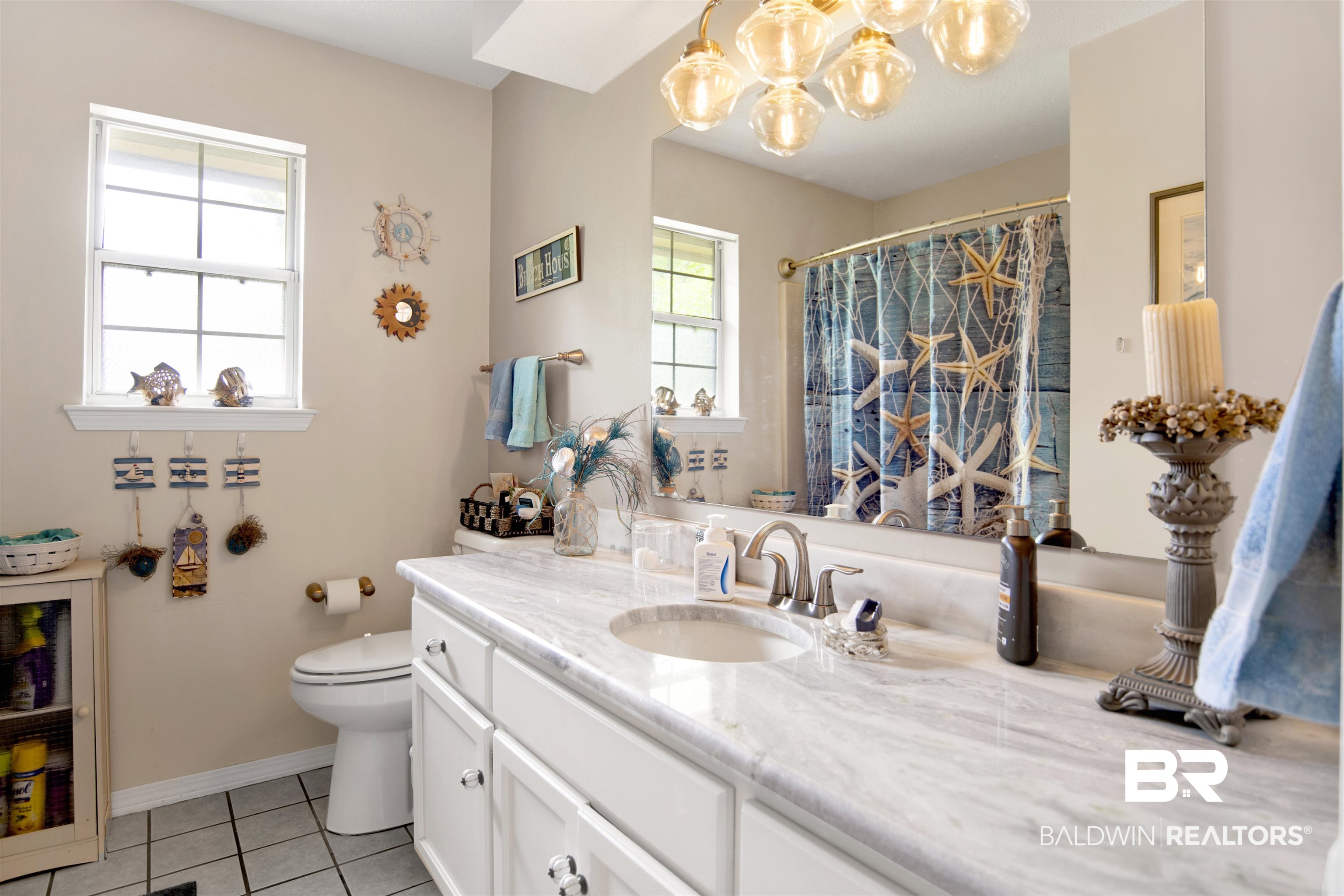 107 Virginia Circle Daphne, AL 36526 - Photo 23 of 47 Bathroom featuring a single basin vanity with white cabinetry and a stone countertop