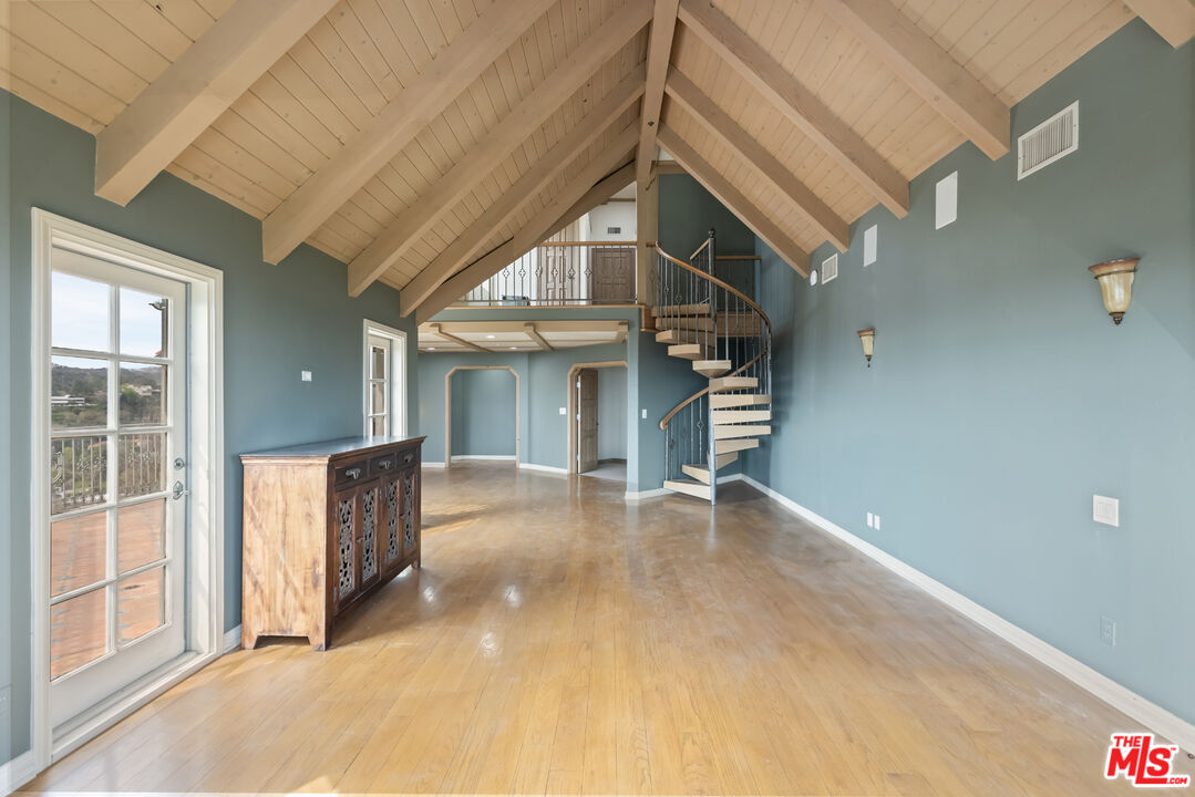 1041 Somera Road Los Angeles, CA 90077 - Photo 19 of 40 a view of a house with a garage