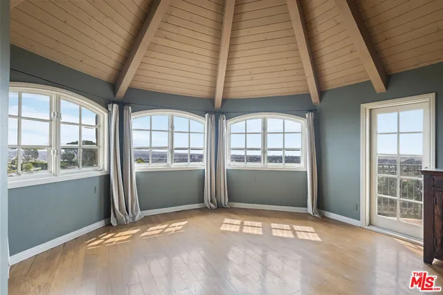 a spacious bathroom with a tub and shower