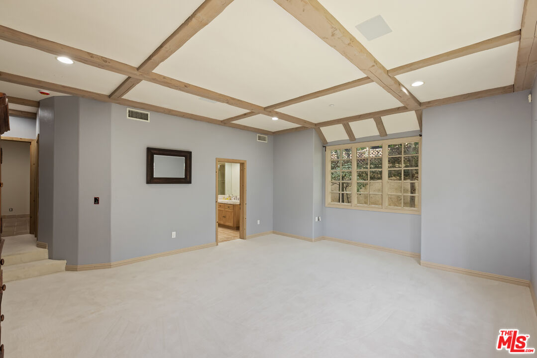 1041 Somera Road Los Angeles, CA 90077 - Photo 24 of 40 a view of an empty room with a window